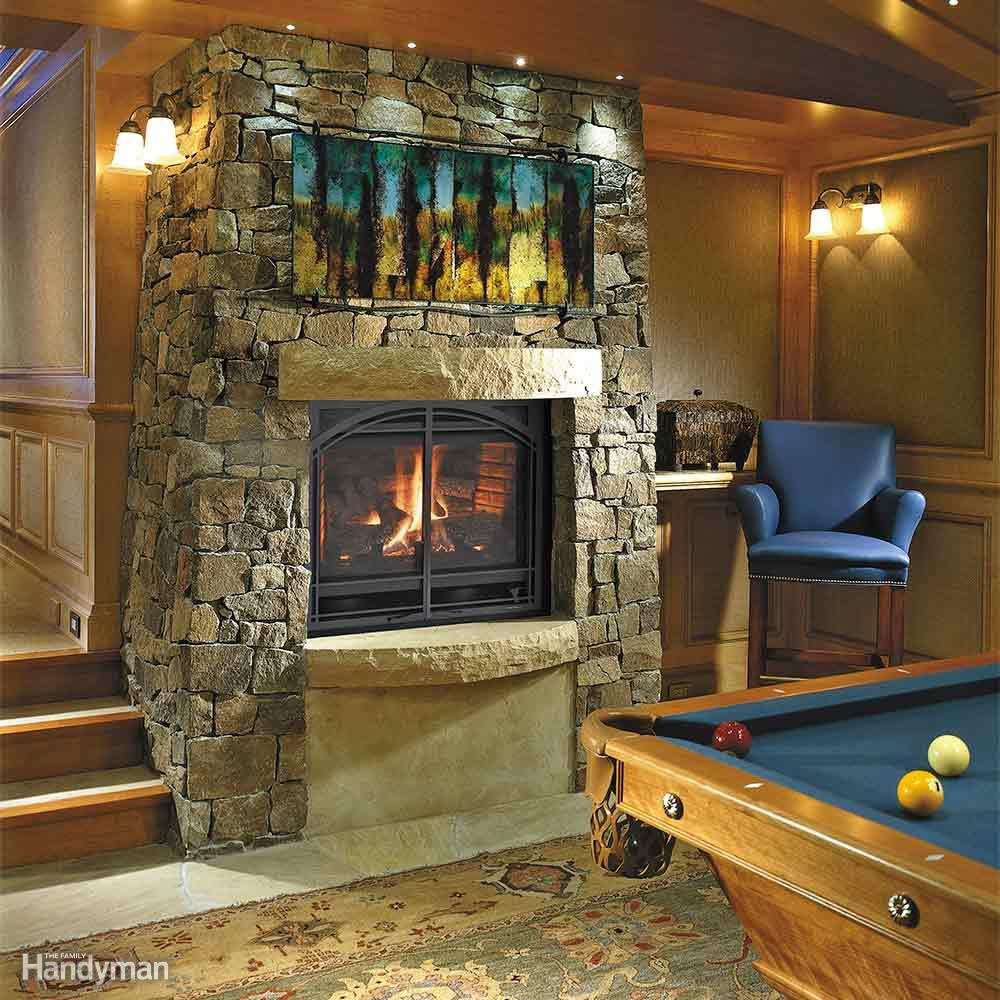 Inviting gas fireplace finishing a basement