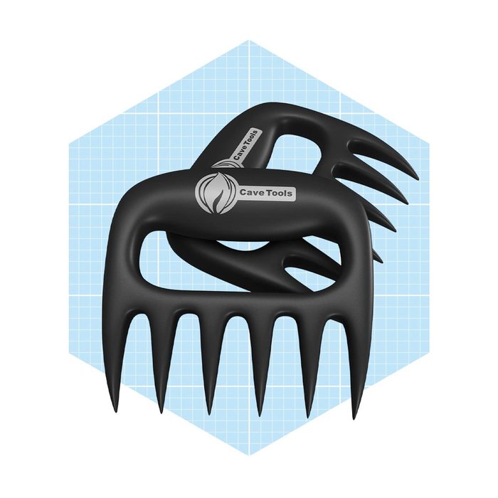 Two black meat shredding claws are crossed over each other, displaying their sharp prongs; set against a light blue, geometric background.