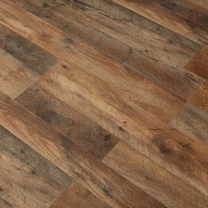 Wooden planks cover the floor, featuring a mix of rich browns with dark streaks, creating a rustic, warm aesthetic in the space.