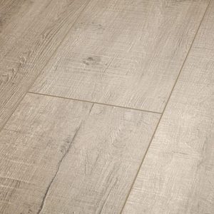 Light-colored wooden flooring covers the surface, featuring a textured finish with visible grain patterns, seamlessly arranged in planks across a flat surface.