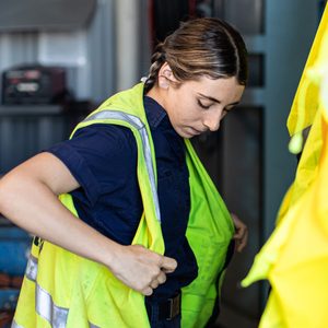 Real life young female aircraft engineer apprentice at work