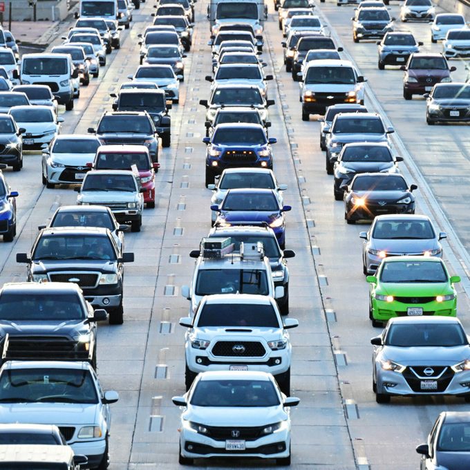 traffic on a six-lane highway at evening